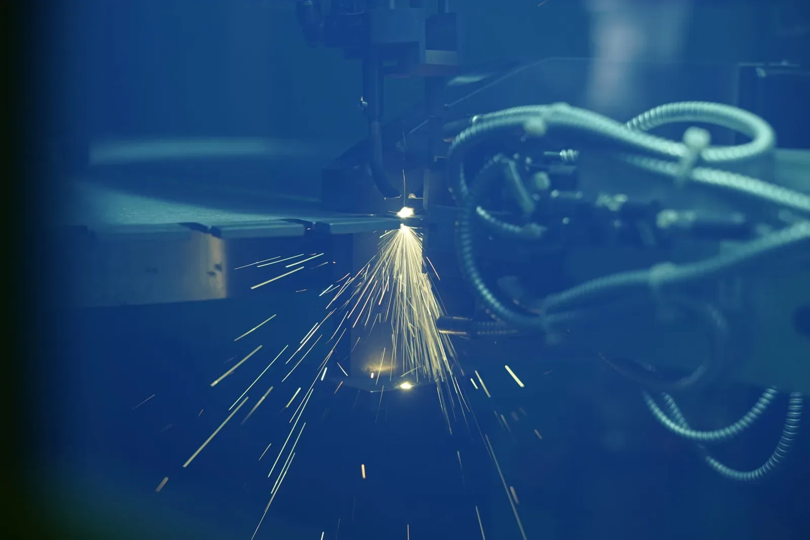 Sparks from laser welding a diamond blade.